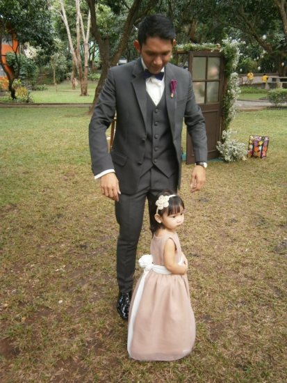 My husband looking mighty fine in his suit while playing with his neice, Marty. He is definitely going to miss having her around!